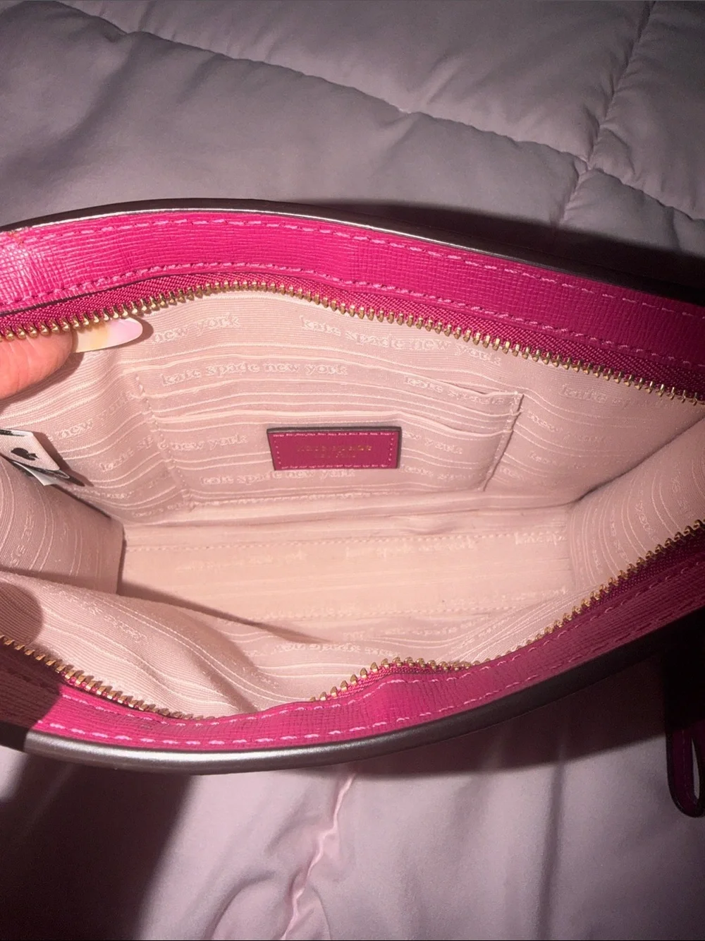 kate spade magenta wristlet clutch with gold logo